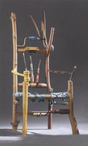 A miniature chair incorporating antique tools